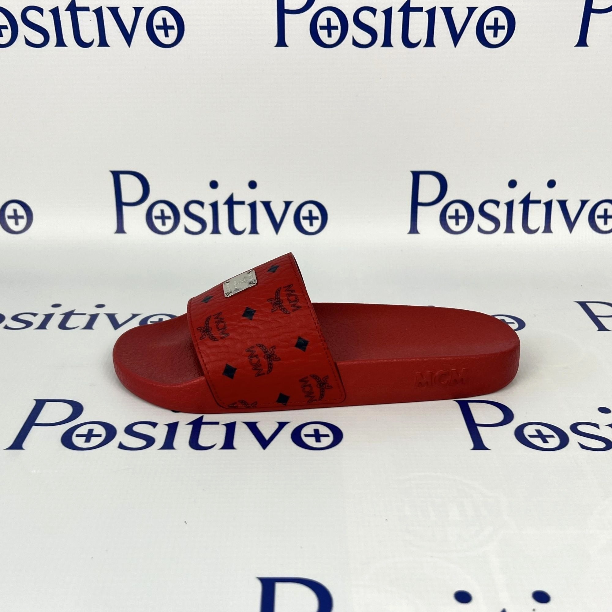 MCM Womens Candy Red Visetos Rubber Slides | Positivo Clothing