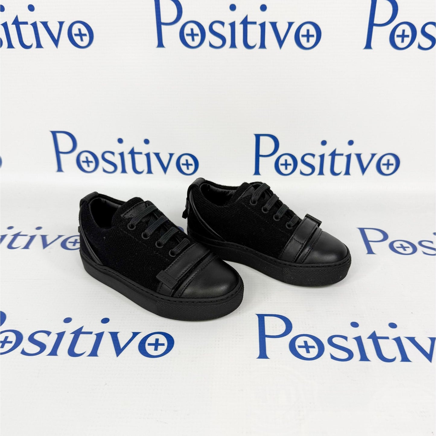 Buscemi 50MM Kid Lana Black Leather Sneakers | Positivo Clothing